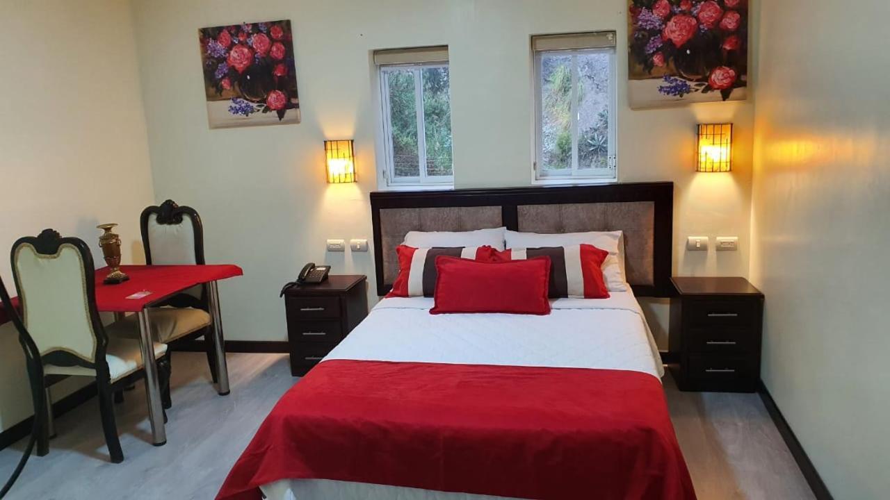 Hotel Loja Bella Bagian luar foto